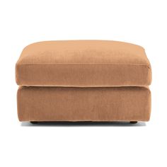 the footstool is shown in tan fabric