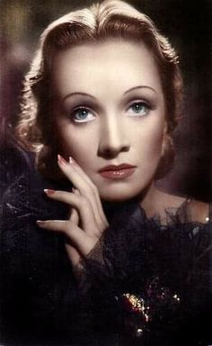 an old photo of a woman with blue eyes