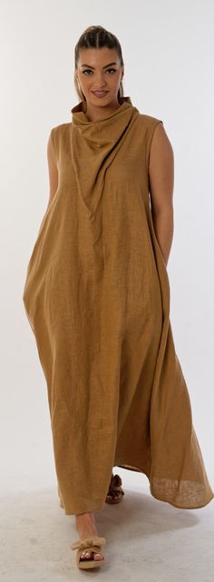 Introducing the impeccably stylish and comfortable maxi long linen dress that exudes charm and draws you in instantly. It combines the carefreeness of a casually draped neckline with an avant-garde and sophisticated style that adds a striking accent to your look. Made entirely from 100% linen, this sleeveless dress flaunts its arms with its unique appeal. Its asymmetric hem adds extra freshness and eccentricity to your look, while the interesting neckline adds sophistication and tenderness to the overall look. The hidden zipper on the back ensures easy dressing and excellent fixation of the dress. With its side pockets and extra volume at the sides, this elegant dress gives you and your style some confidence and functionality. Combining the natural beauty of linen with premium craftsmanshi Solid Color Relaxed Fit Maxi Dress For Vacation, Vacation Maxi Dress Solid Relaxed Fit, Relaxed Fit Solid Color Maxi Dress For Vacation, Bohemian Maxi Dress In Solid Color, Bohemian Solid Color Maxi Dress, Casual Plain Maxi Dress For Beach, Solid Cotton Maxi Dress For Beach, Linen Dress For Daywear, Solid Color Linen Dress For Daywear