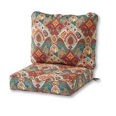 an outdoor chair cushion that is made from fabric and has a colorful pattern on it