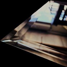 a diamond shaped object sitting on top of a table