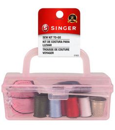 six spools of sewing thread in a plastic box with pink and white packaging