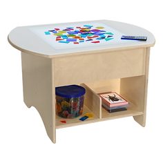 a child's wooden table with toys on it