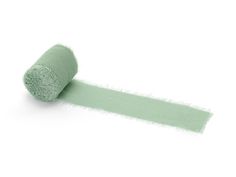 a roll of green toilet paper on a white background with the end rolled up to show it's adhesiveive tape