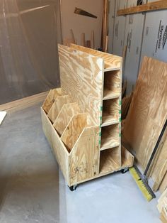 several wooden boxes are stacked on top of each other in the process of being assembled