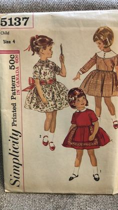 an old sewing pattern for girls'dresses and shoes