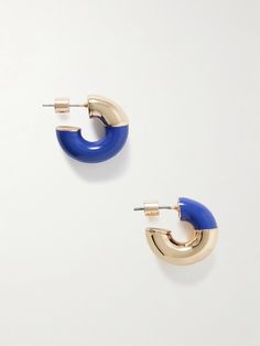 Roxanne Assoulin is an expert at injecting classic silhouettes with playful details. These hoop earrings are made from gold-tone metal and dipped in vibrant blue enamel - note their asymmetric coatings. Style yours as a set with the matching bracelets. Roxanne Assoulin, Fashion Jewelry Earrings, Vibrant Blue, True Blue, Bracelets And Charms, Matching Bracelets, Blue Earrings, Watches Jewelry, Cute Earrings