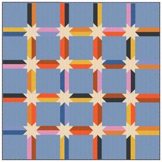 a blue quilt with multicolored squares and lines on the bottom, as well as an arrow in the middle