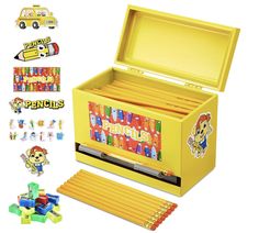 a yellow toy box filled with lots of magnets next to other toys and stickers