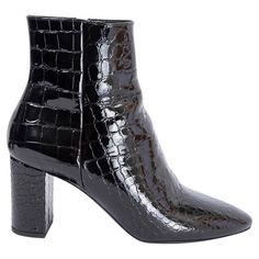 100% authentic Saint Laurent Jane ankle boots in black croco embossed patent leather featuring almond toe and high block heel. Open with a zipper on the inside. Have been worn once and are in excellent condition. Measurements Imprinted Size 37.5 Shoe Size 37.5 Inside Sole 24cm (9.4in) Width 7cm (2.7in) Heel 7cm (2.7in) Shaft 13cm (5.1in) Top Circumference 22cm (8.6in) All our listings include only the listed item unless otherwise specified in the description above. Elegant Leather Heeled Boots With Crocodile Pattern, Black Patent Leather Lace-up Heeled Boots, Black Patent Leather Ankle Lace-up Boots, Black Patent Leather Lace-up Boots With Reinforced Heel, Luxury Ankle-high Patent Leather Heeled Boots, Black Patent Leather, Patent Leather, Block Heels, Clothing And Shoes