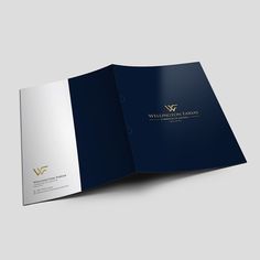 an open brochure is shown with the company logo in gold and blue on it