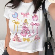 Watercolor Coquette Bows Disney Princess Baby Tee, Disney Girl Trip Croptop Women T-shirt, Princess Birthday Girl Shirt, Cinderella Rapunzel. Elevate your wardrobe with our stylish shirts. Made from premium materials, our shirts combine fashion and comfort seamlessly. Whether you're dressing up for an event or going for a casual look, our collection offers the perfect choice. Discover an array of colors and patterns to suit your unique style. Make a statement and upgrade your fashion game with our shirts. #birthday girl #baby #disney princess #Shirt #Alwaysky Disney Baby Tee, Pink Cartoon Print Top For Disney Fan Events, Playful Pink Top For Disney Fan Events, Pink Disney Tops For Summer, Cute Tops For Disney Fan Events In Summer, Disney Style Tops For Summer Fan Events, Disney Pink Tops With Character Print, Disney Graphic Print Pink Top, Pink Disney Graphic Print Top