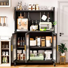 an open kitchen cabinet filled with lots of cooking utensils and other things on the shelves