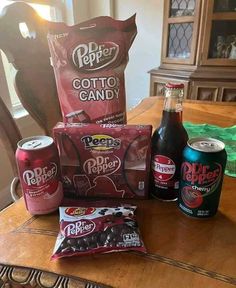 various snacks and drinks sitting on a table