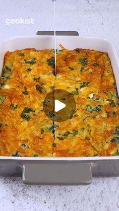 a casserole dish with broccoli and cheese