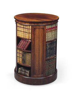 a wooden book shelf with many books on the shelves and two rows of books in it