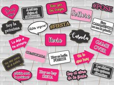 pink, black and white photo booth props with conversation bubbles on them for bridal party