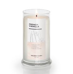 a candle that is sitting in front of a white background with the words french vanilla on it