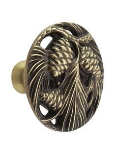 an antique style door knob with fish design