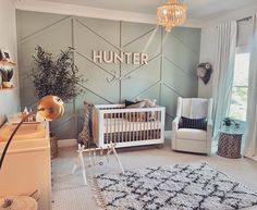 a baby's room decorated in neutral colors