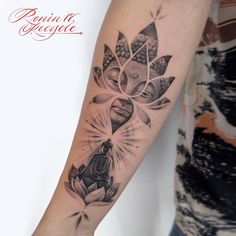 a woman's arm with a tattoo on it and an image of a buddha