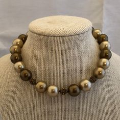 "Vintage Beaded Necklace Shades of Brown Beige Off White Cream Round Resin Pearls Gold Rondelles Single One Strand Choker Style 1950's Description:  This is a beaded necklace made with resin pearls in colors of chocolate brown and beige with gold rondelle rhinestones and a hook clasp. Size:  Measures approximately 15\" in length Condition:  Good condition for being vintage, but the metal is showing wear due to it's age. Want to purchase 3 or more items from my shop?  Please use the following cou Cheap Handmade Brown Choker, Tiny Charms, Blown Glass Pendant, Surfer Necklace, Tiny Charm, Vintage Beads Necklace, Hill Tribe Silver, Choker Style, Shades Of Brown