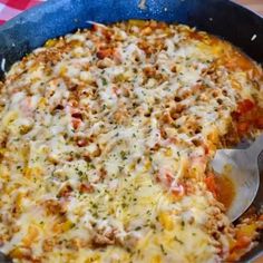 a casserole with meat and cheese in a pan