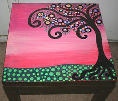 a table with a tree painted on it