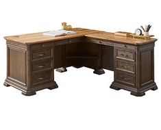 an office desk with two drawers on each side