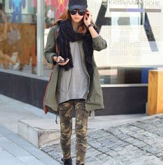 Something as simple as opting for an army green military jacket and brown camo leggings can potentially set you apart from the crowd.  Shop this look for $158:  http://lookastic.com/women/looks/cap-sunglasses-scarf-crew-neck-sweater-military-jacket-tote-bag-leggings/4954  — Black Cap  — Black Sunglasses  — Black Scarf  — Grey Crew-neck Sweater  — Olive Military Jacket  — Tobacco Leather Tote Bag  — Brown Camouflage Leggings Army Leggings Outfit, Printed Leggings Outfit, Olive Military Jacket, Leggings Outfit Casual, High Waist Sports Leggings, Army Print, Military Jacket Green, Camouflage Leggings, Leggings Outfit