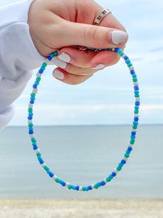 Trendy Blue Beaded Choker, Trendy Blue Choker With Colorful Beads, Casual Blue Choker With Colorful Beads, Trendy Summer Green Choker, Trendy Handmade Beaded Choker Necklace, Trendy Adjustable Choker With Round Beads, Trendy Adjustable Turquoise Choker, Trendy Round Beads Choker For Festivals, Casual Blue Choker As Gift