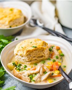 a white bowl filled with chicken pot pie