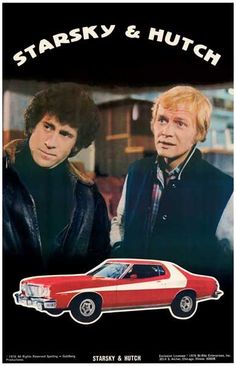 two men standing next to each other in front of a red car with the words starky and hutch on it