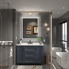 a bathroom with two sinks and a large mirror above the sink is lit by lights