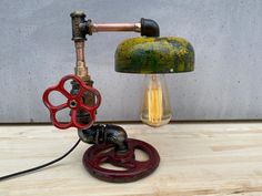 a lamp made out of an old light bulb