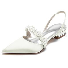 a pair of white shoes with pearls on the heel