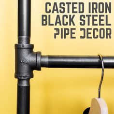 an image of a pipe that is connected to the wall and has text reading cast iron black steel pipe decor