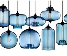 several blue hanging lights with one light on each side and the other in different shapes