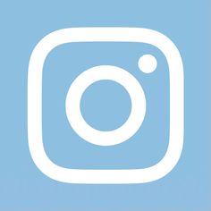 a white instagram icon on a blue background