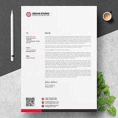 a professional letterhead is displayed next to a cup of coffee