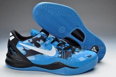 the nike zoom basketball shoe is blue and black with white lettering on the upper part