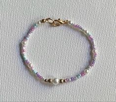 Purple Diy Bracelet, Small Beads Bracelets Ideas Aesthetic, Small Beads Bracelets Ideas, Purple Bead Bracelet Ideas, Purple Bracelets Beads, Purple Beads Bracelets, Beads Anklets Ideas, Purple Bracelet Ideas, Seed Bead Bracelets Ideas