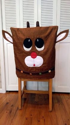 a chair that has been made to look like a reindeer's head on it