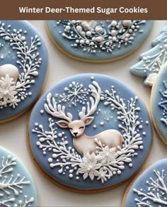 decorated sugar cookies with frosting and reindeers on them for winter deer - themed sugar cookies