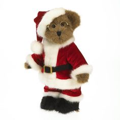 a teddy bear dressed in a santa suit with glasses and a belt, standing on its hind legs