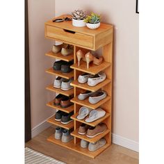 a wooden shoe rack with several pairs of shoes