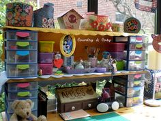 an assortment of items on display in front of a window