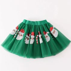 Get Into The Holiday Spirit With Our Green Santa Claus Sequin Tutu Skirt! This Fun And Whimsical Skirt Adds A Lively Touch To Any Outfit. Featuring A Festive Sequin Design And A Comfortable Tutu Style, It’s Ideal For All Holiday Events. Spread Cheer And Stand Out With This One-Of-A-Kind Skirt. Happy Holidays! Tutu Style, Unique Skirt, Sequin Crafts, Green Santa, Unique Skirts, Patriotic Christmas, Girls Skirts, Plaid And Leopard, Sequin Design