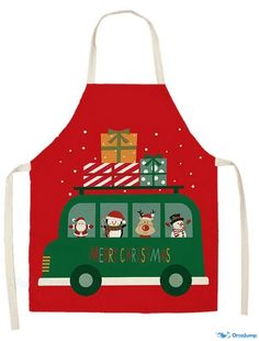 a green bus with christmas decorations on it's roof and an apron hanging from the front