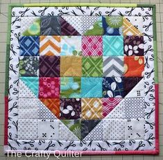 a heart made out of many different colored squares